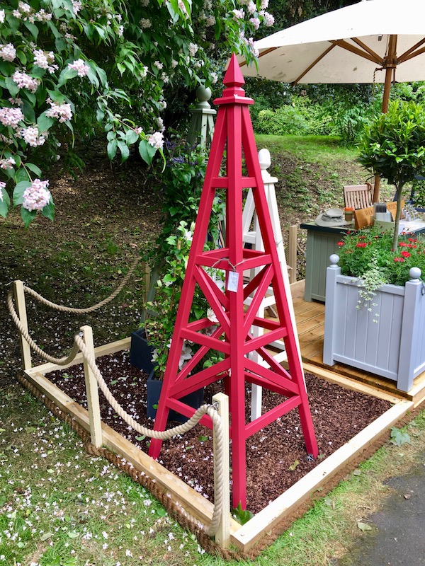 The Chelsea Star Obelisk painted Rectory Red on display at RHS Chelsea Flower Show 2018