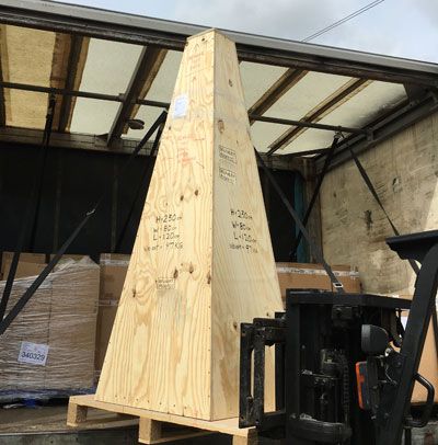 Wooden garden obelisk packed into bespoke wooden crate and loaded onto lorry for international shipping
