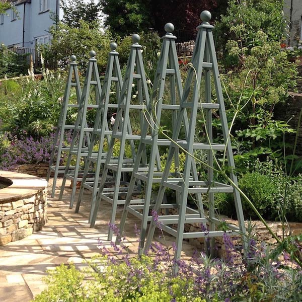  6 Wooden Garden Obelisks painted Wild Thyme, Cuprinol Garden Shades. Supplied to award winning garden designer, Paul Hervey-Brookes 