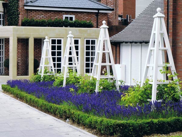  The Belfry Hotel large painted wooden garden obelisks 